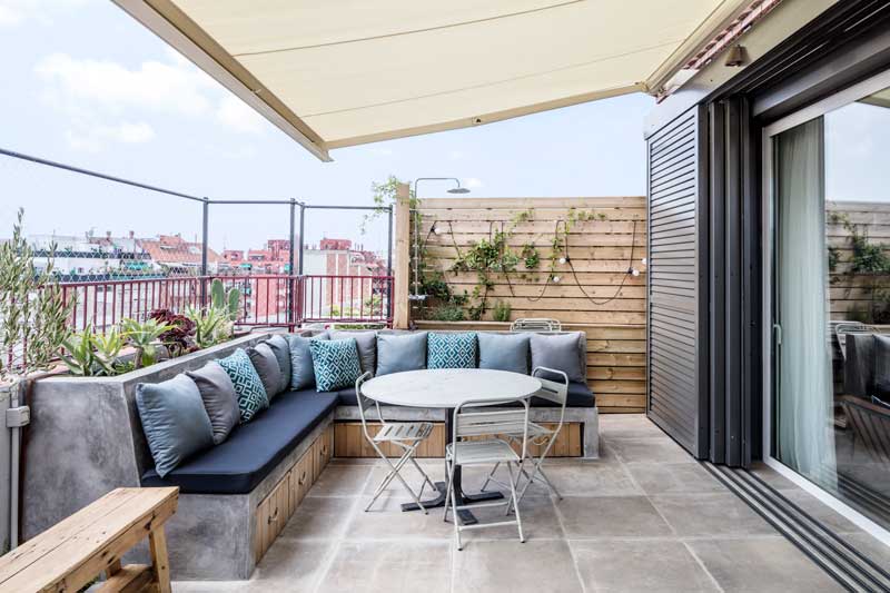 Ático de lujo con pérgola bioclimática y cortinas de cristal